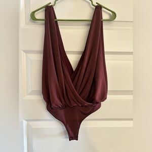 Free people bodysuit, size xs. Worn once!